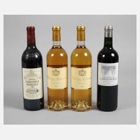 Vier Flaschen Wein111