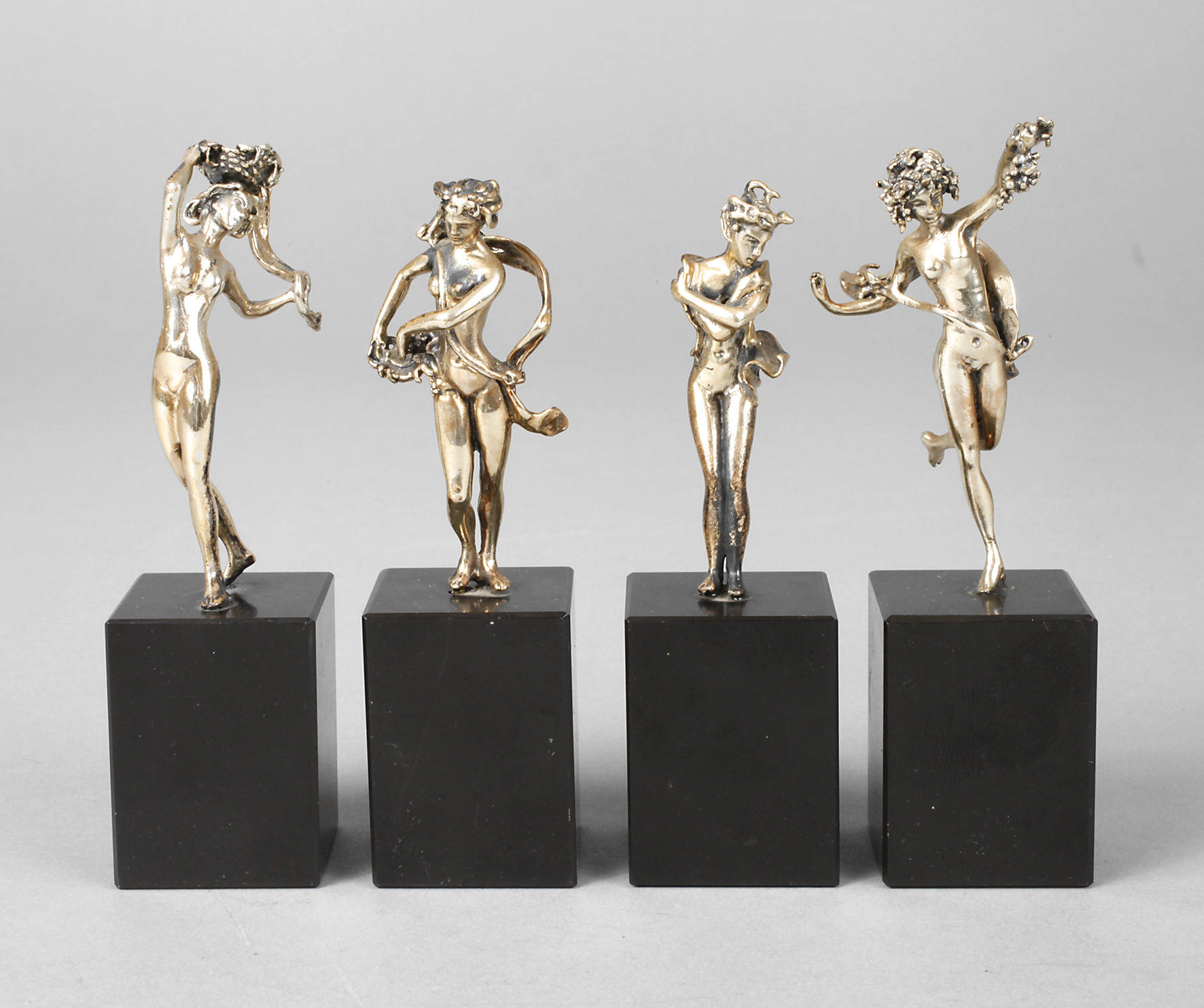 Vier Silberfiguren