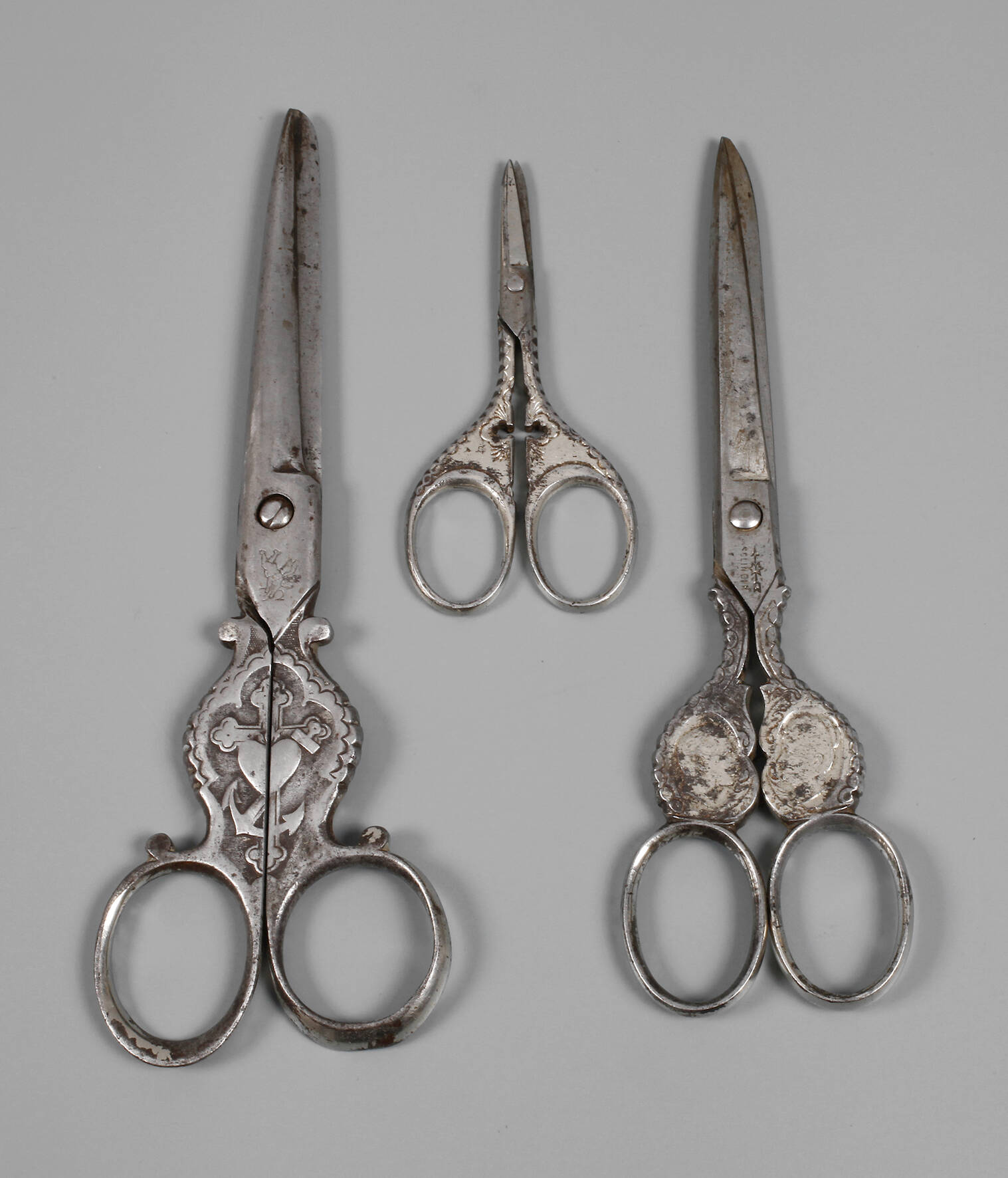 Drei Scheren