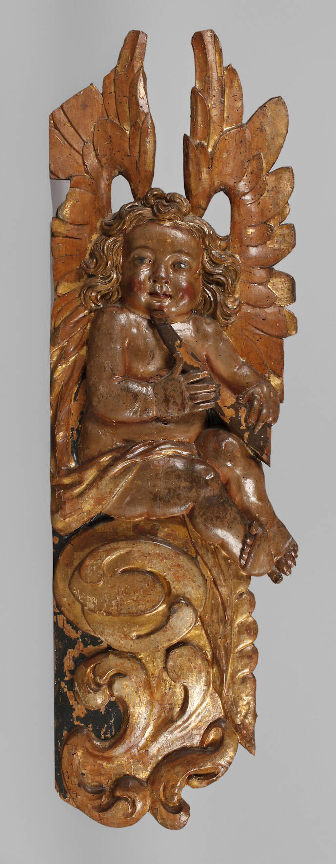 Figürliche Reliefschnitzerei