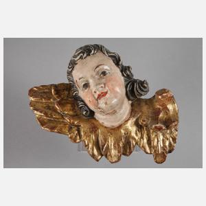 Paar geschnitzte Engelsköpfe