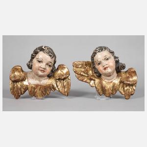 Paar geschnitzte Engelsköpfe