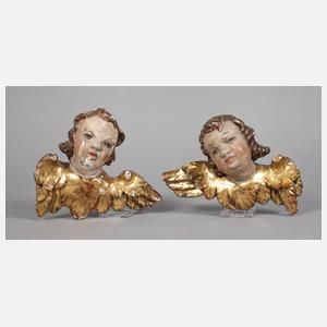 Paar geschnitzte Engelsköpfe
