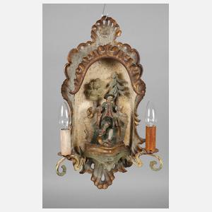 Figürliche Wandlampe