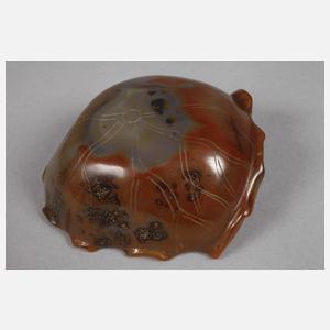 Drei Steinschnitzereien