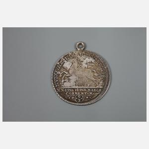 Drei gehenkelte historische Münzen