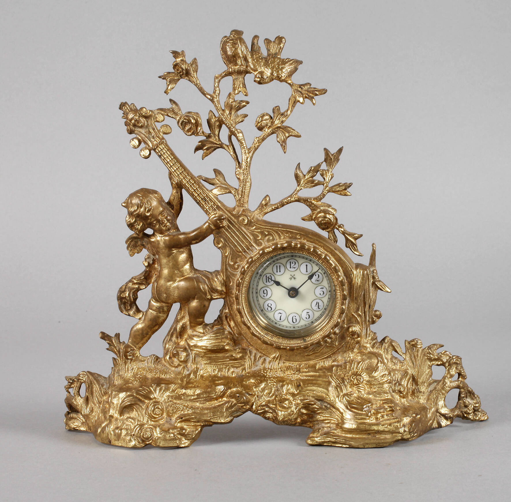 Figürliche Tischuhr