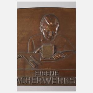 Bronzerelief Uhrmacherwerkstätte