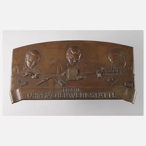Bronzerelief Uhrmacherwerkstätte
