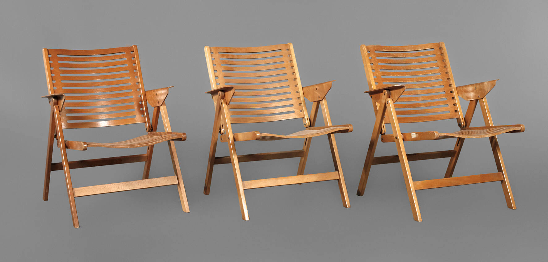 Drei „REX“ Klappstühle
