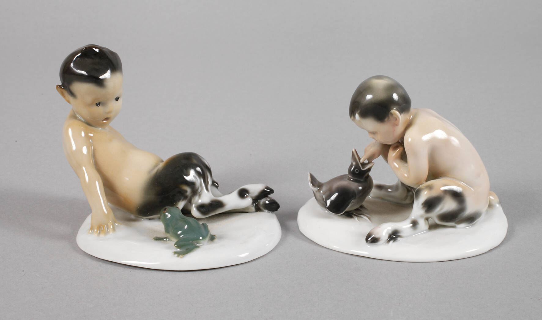 Goebel zwei Faune mit Tieren