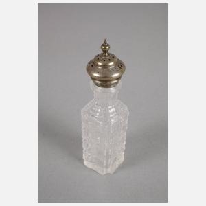 Vier Flakons und ein Serviettenhalter