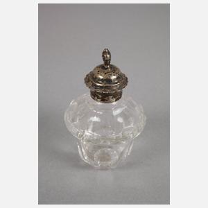 Vier Flakons und ein Serviettenhalter