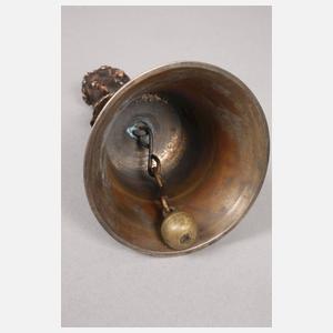 Figürliche Tischglocke