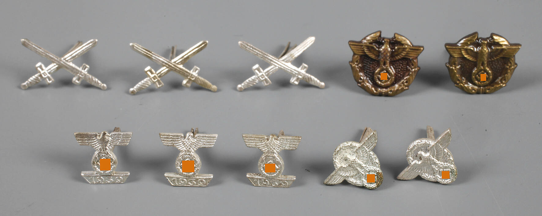 Zehn Bandspangenauflagen