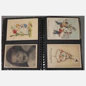 Zwei Postkartenalben Kinder–Kitsch
