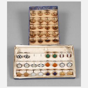 Zwei Verkaufsetuis mit Manschettenknöpfen