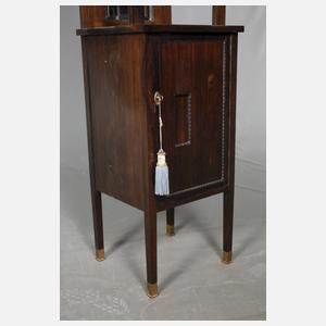 Paar Pfeilervitrinen