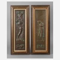 Zwei Eisengussreliefs111