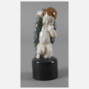 Putto mit Blütengirlande