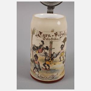 Bierkrug mit afrikanischem Motiv