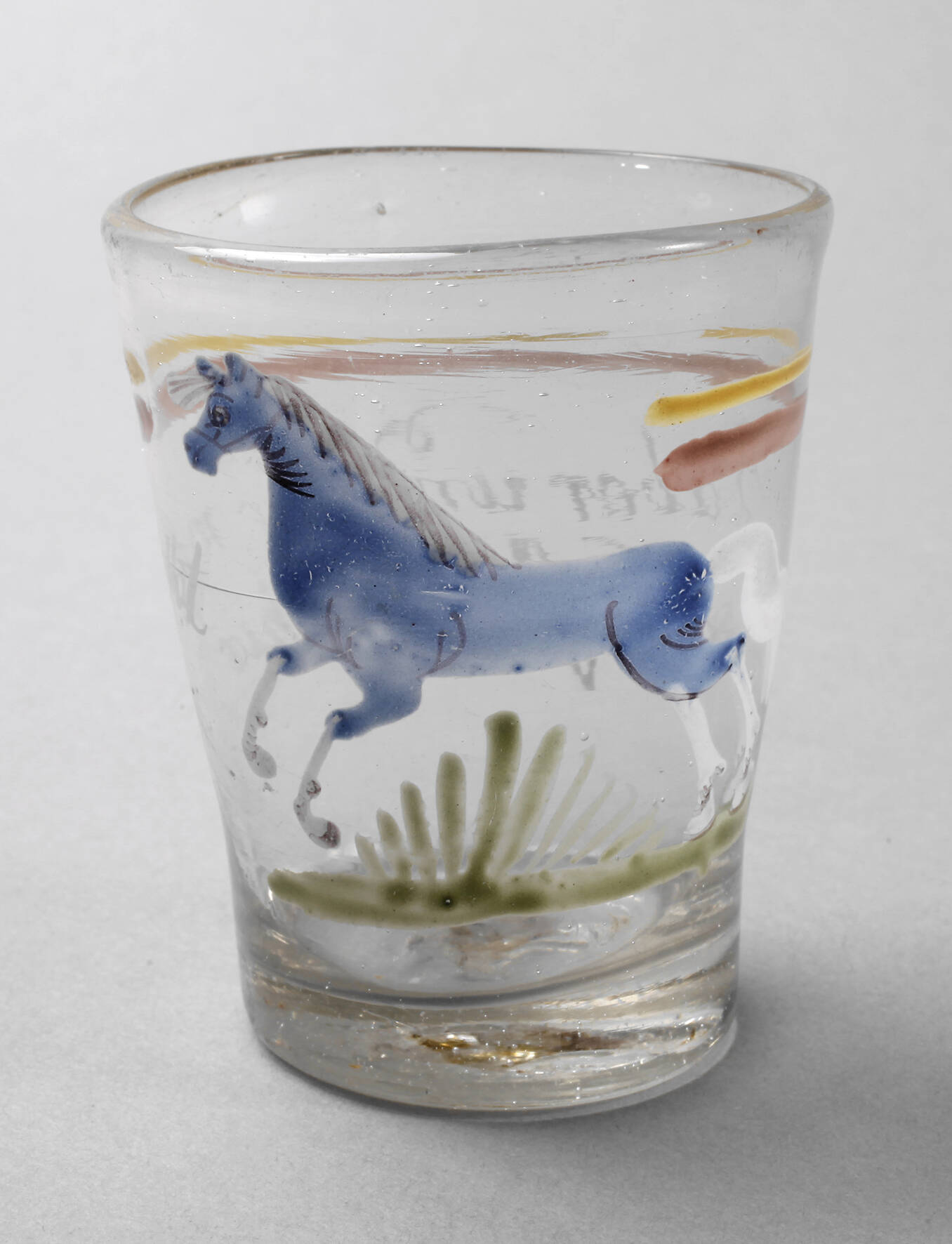 Spruchglas mit springendem Pferd