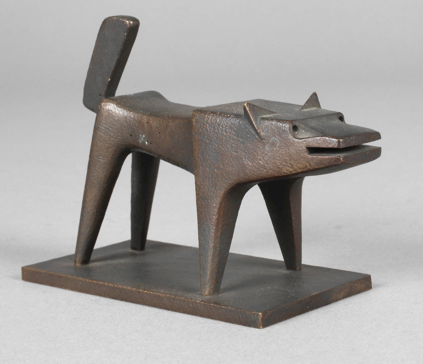 Kleinbronze kubistischer Hund