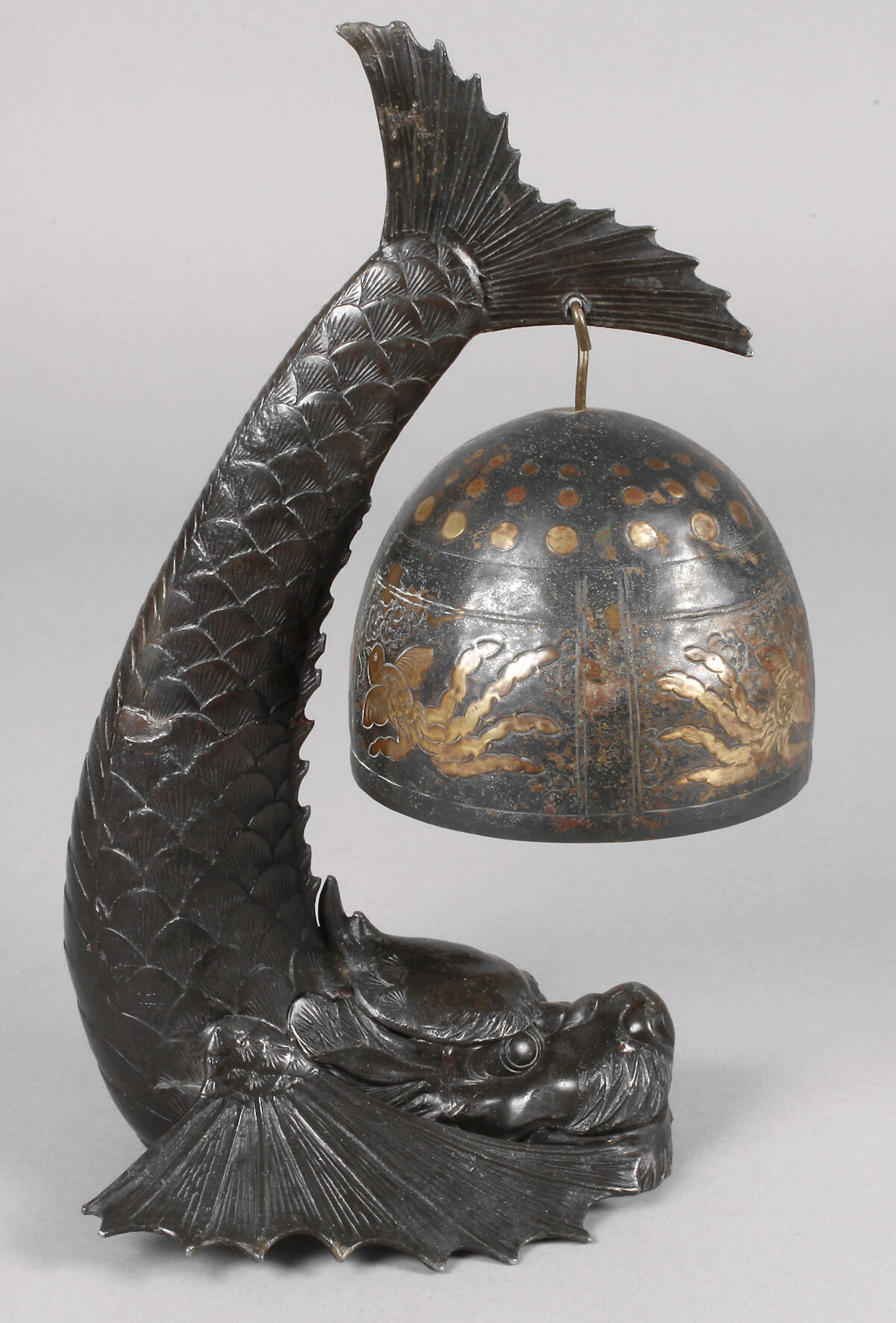 Figürliche Tischglocke