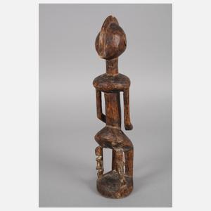 Drei figürliche Schnitzereien