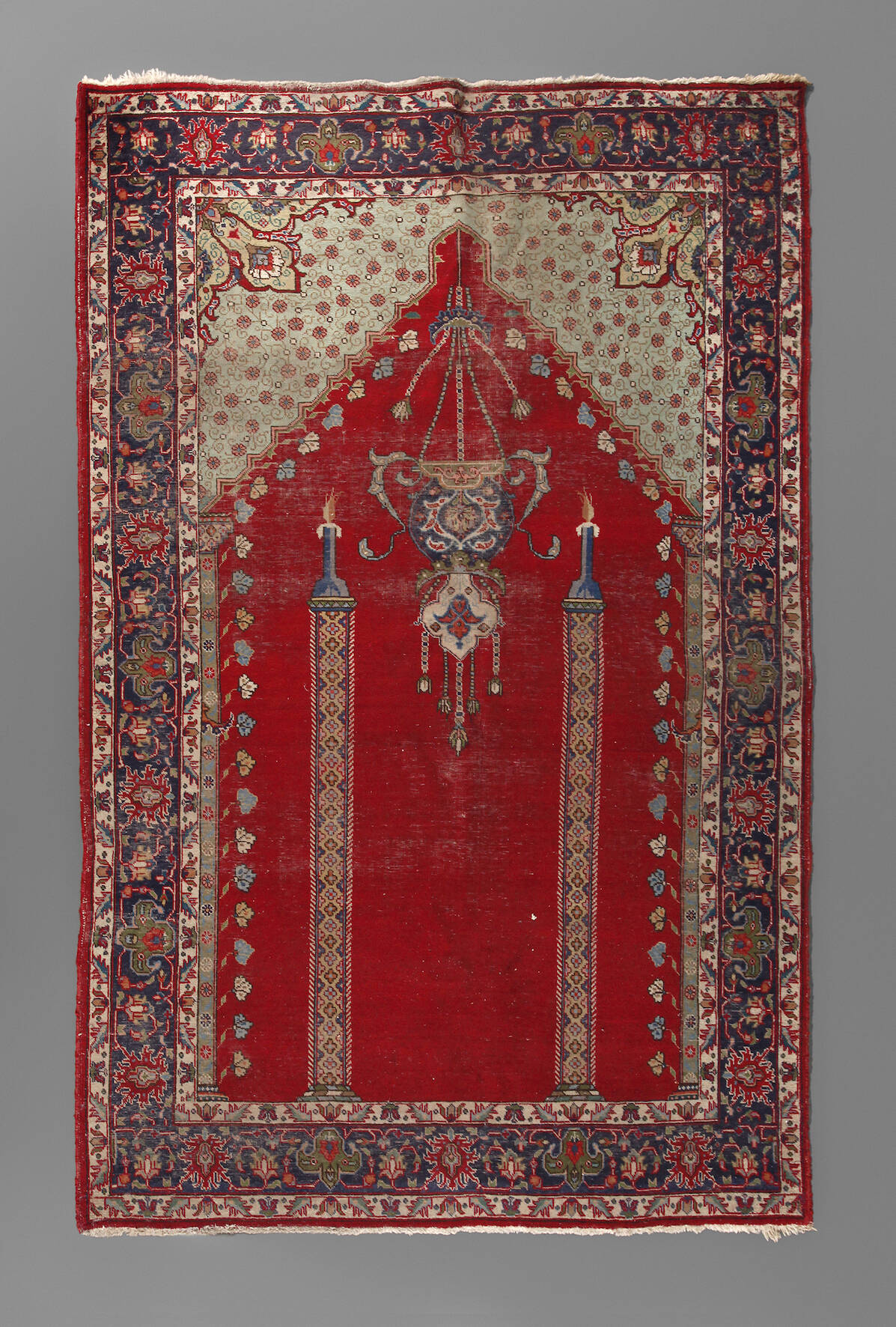 Teppich mit Gebetsmotiv