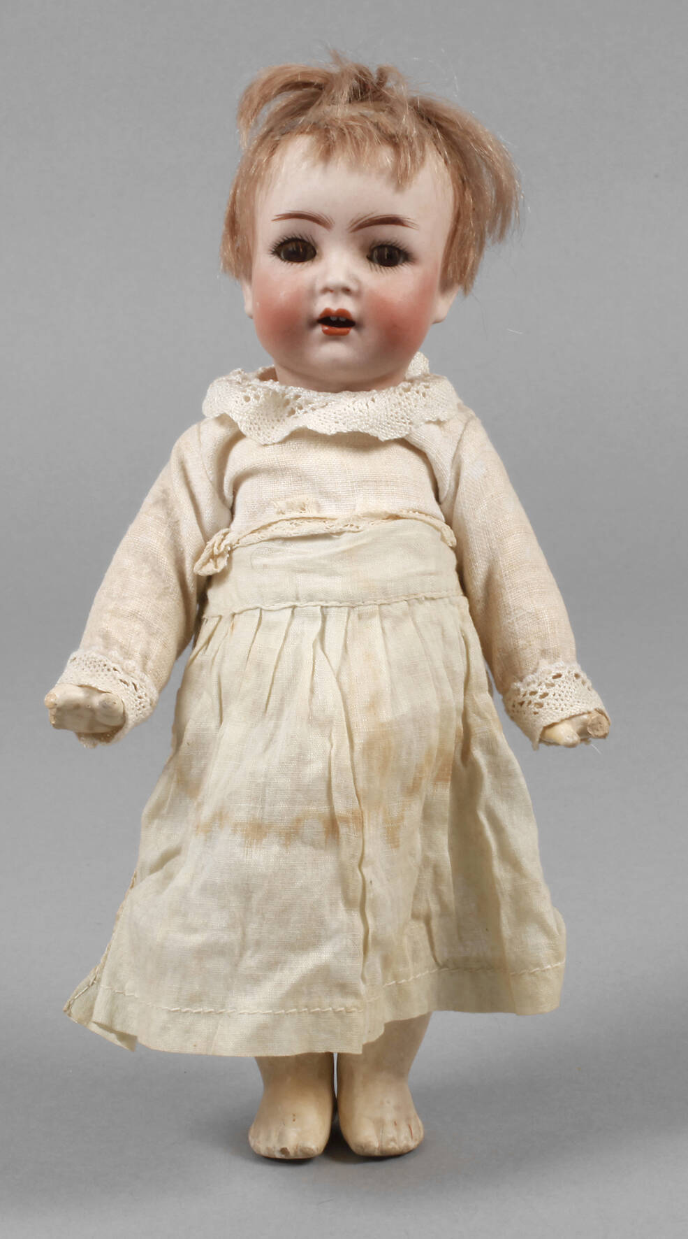 Kämmer & Reinhardt kleine Porzellankopfpuppe