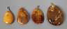 Vier Bernsteinanhänger
