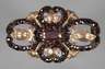 Brosche mit Granaten