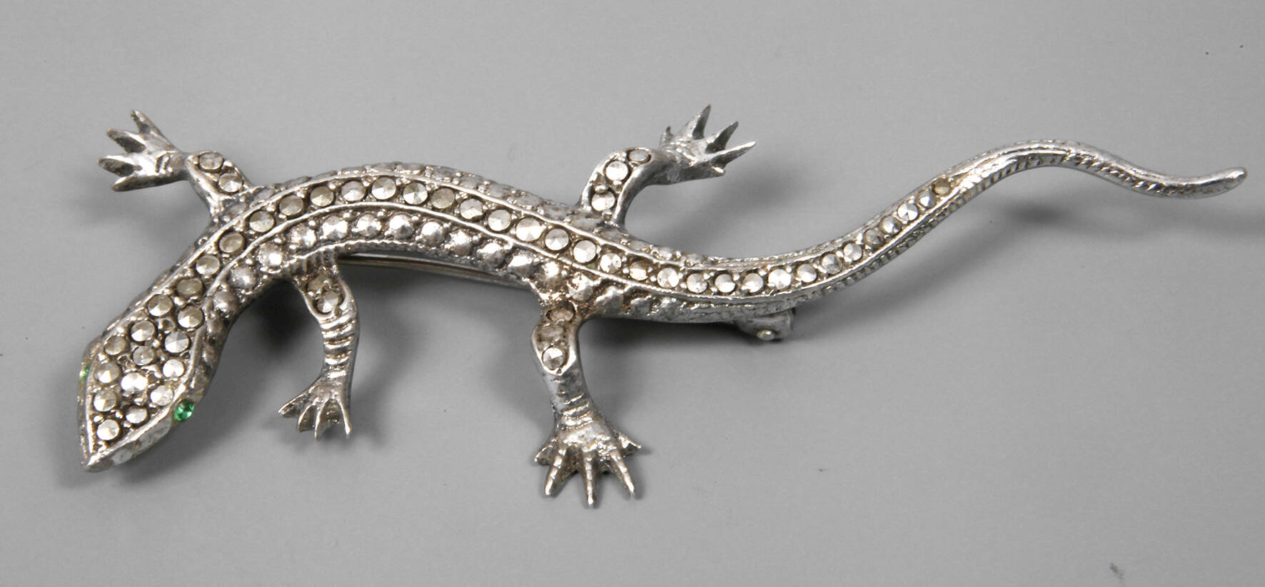 Brosche als Eidechse