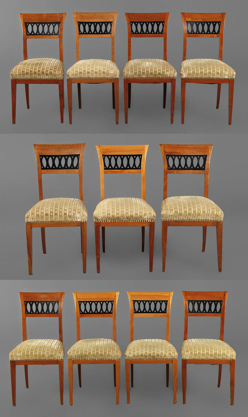 Elf Stühle im Biedermeierstil