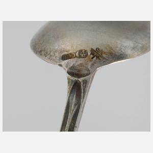 Zwölf Kaffeelöffel