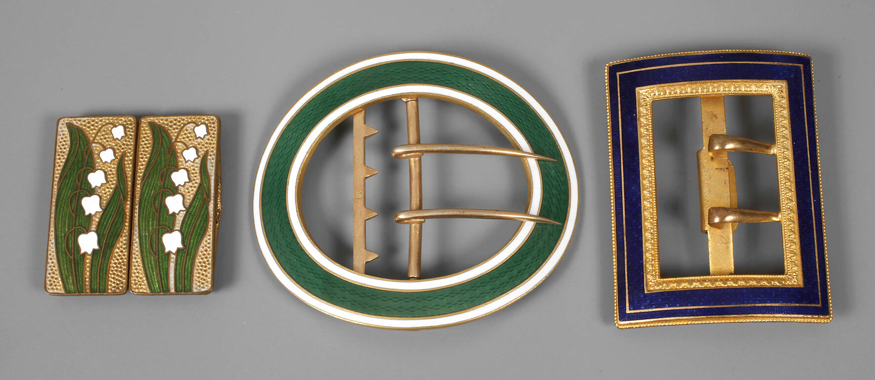 Drei Gürtelschnallen