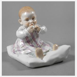 Meissen "Kind, auf einem Kissen sitzend"