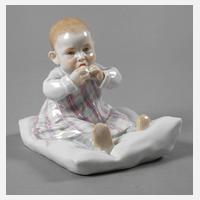 Meissen "Kind, auf einem Kissen sitzend"111