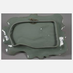 Reliefbild mit Frauenkopf