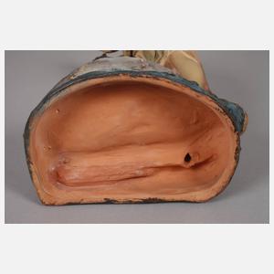 Figürlicher Spiegelhalter