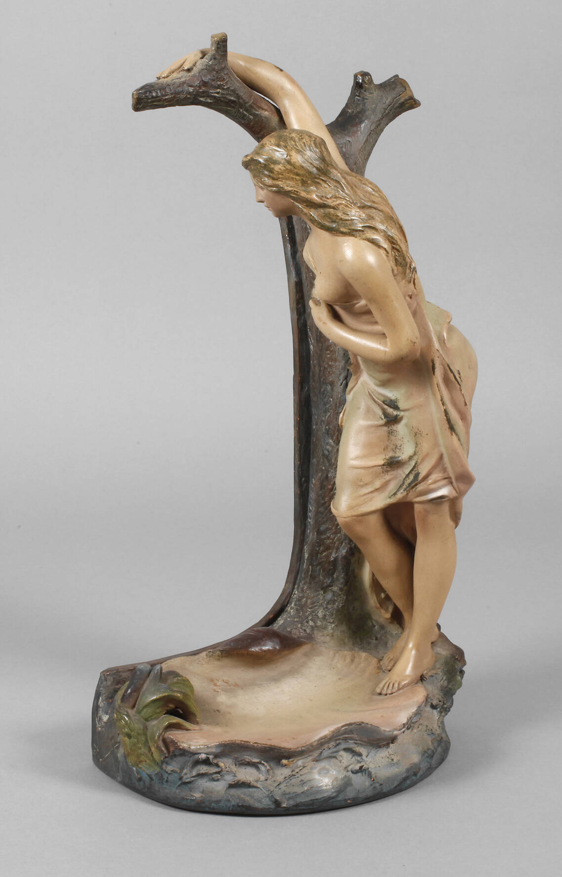 Figürlicher Spiegelhalter