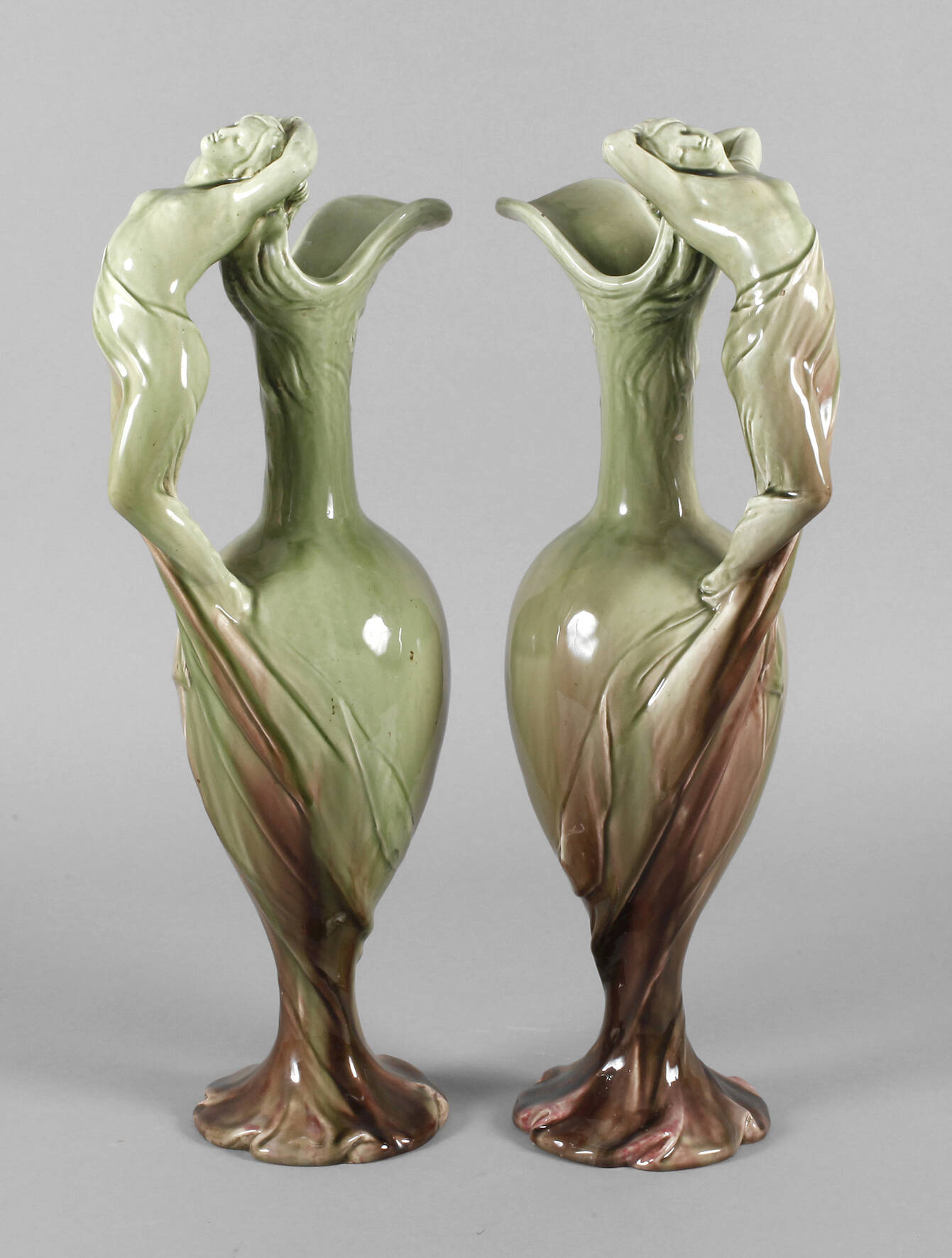 Paar große figürliche Laufglasurvasen