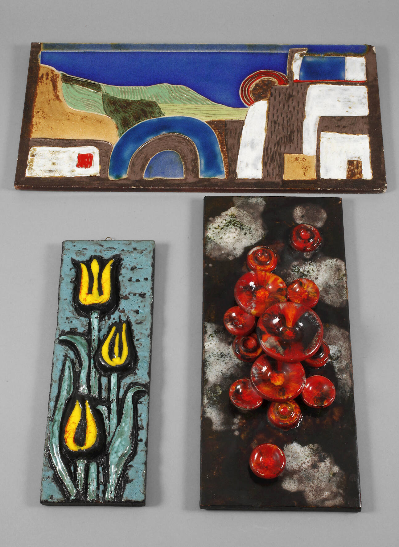 Drei moderne Wandplatten