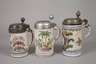 Drei Fayencewalzenkrüge