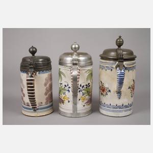 Drei Fayencewalzenkrüge