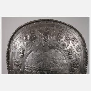 Wappenschild mit Schlachtenszene