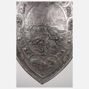 Wappenschild mit Schlachtenszene