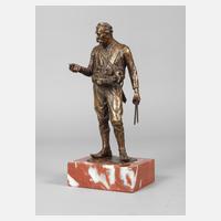 Bronzeplastik Stockverkäufer111