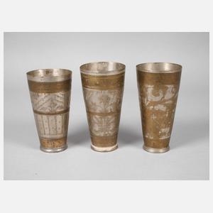 Drei Messingbecher